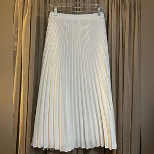 White pleated skirt